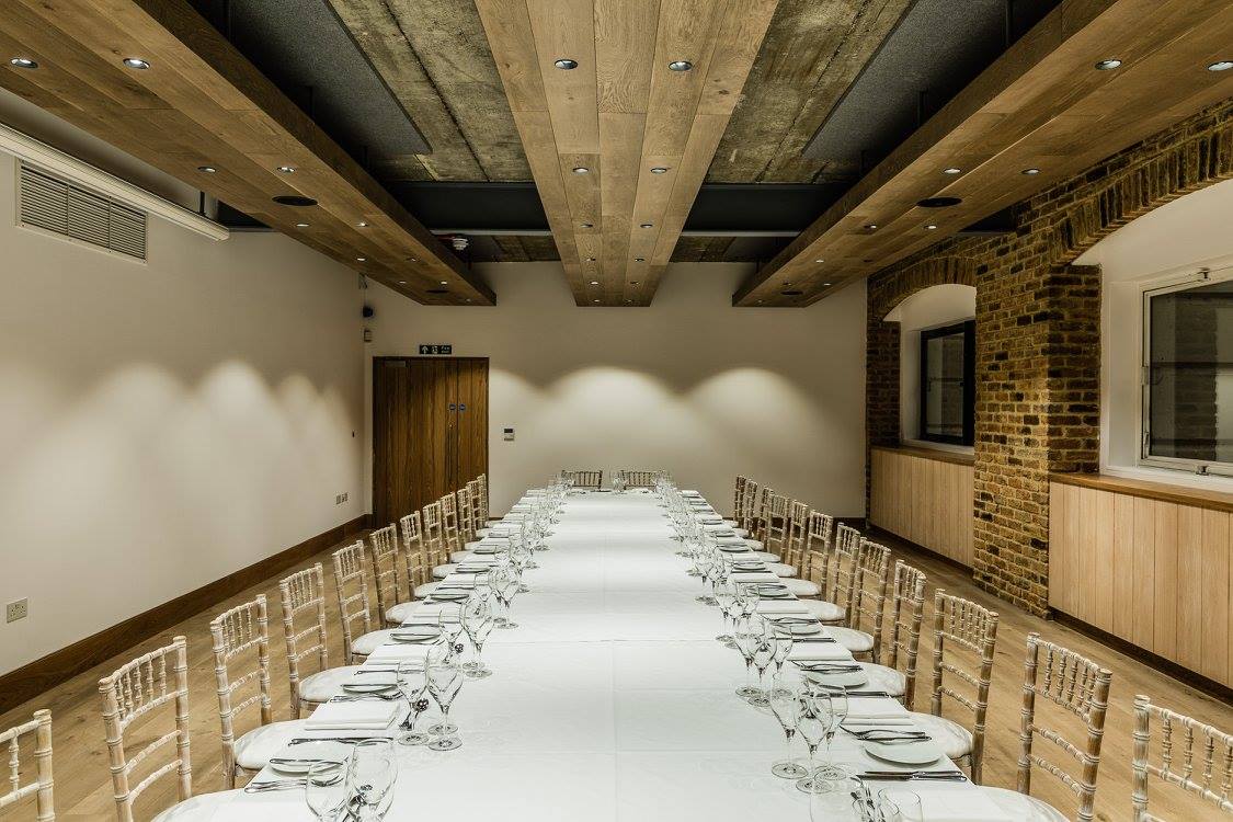 Long table dining setup at Glaziers Hall