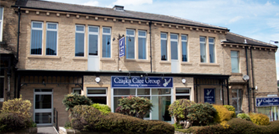 Stone-fronted building with Czajka Care Group Training Centre signage