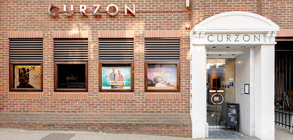 Curzon's brick exterior with film poster display windows