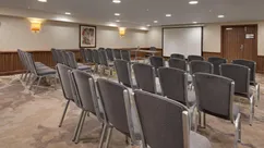 Chelsea Room set theatre-style with rows of grey upholstered chairs