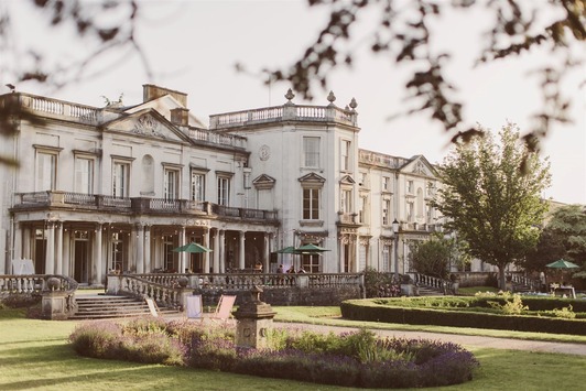 Grove House stately exterior with formal gardens and lavender beds in summer.